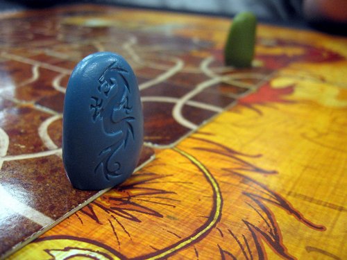 Blue piece on the edge of the board